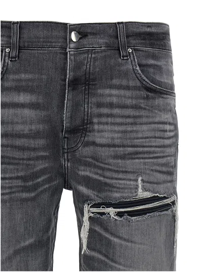 Amiri Stretch Denim Jeans Distressed Detailing In Black