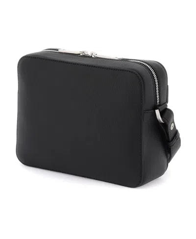 Ferragamo Logo Embossed Shoulder Bag In Black