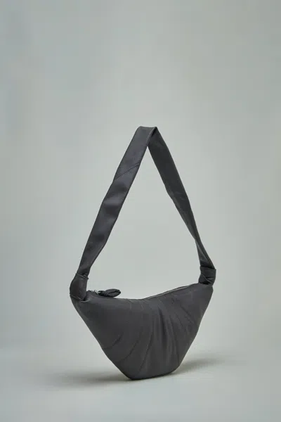 Lemaire Cross-body Bag With Adjustable Strap And Textured Finish In Brown