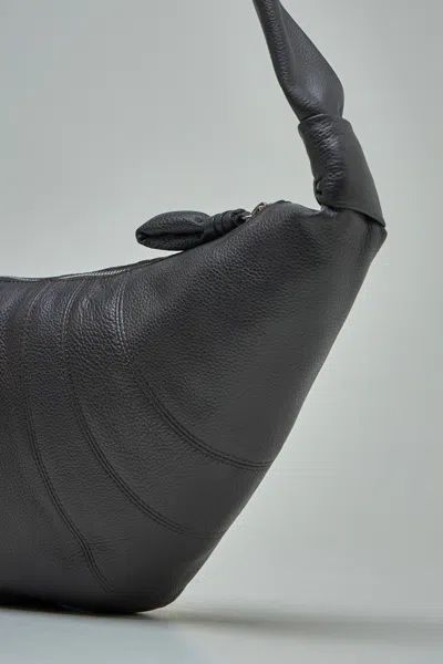 Lemaire Cross-body Bag With Adjustable Strap And Textured Finish In Brown