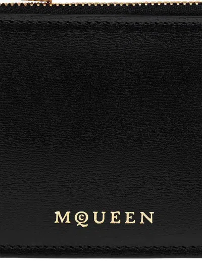 Alexander Mcqueen Logo Stamped Leather Zip Cardholder In Black