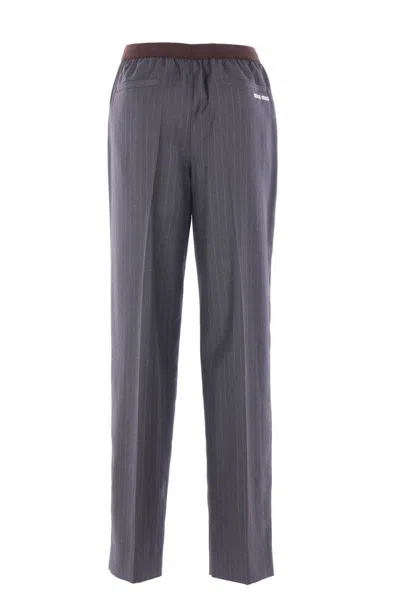 Miu Miu Virgin Wool Logo Pants In Blue