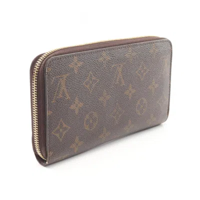 Pre-owned Louis Vuitton Brown Coated Canvas Monogram Pvc Long Wallet (bi-fold) ()