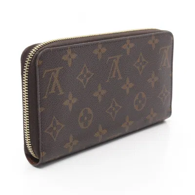 Pre-owned Louis Vuitton Brown Coated Canvas Monogram Pvc Long Wallet (bi-fold) ()
