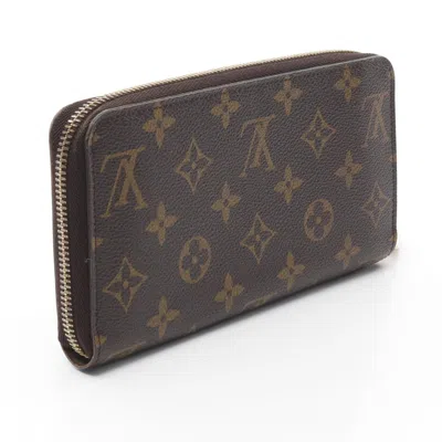 Pre-owned Louis Vuitton Brown Coated Canvas Monogram Pvc Long Wallet (bi-fold) ()