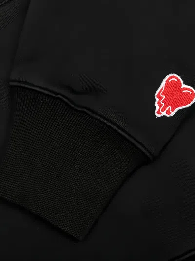 Emotionally Unavailable Melting-heart Logo Hoodie In Black