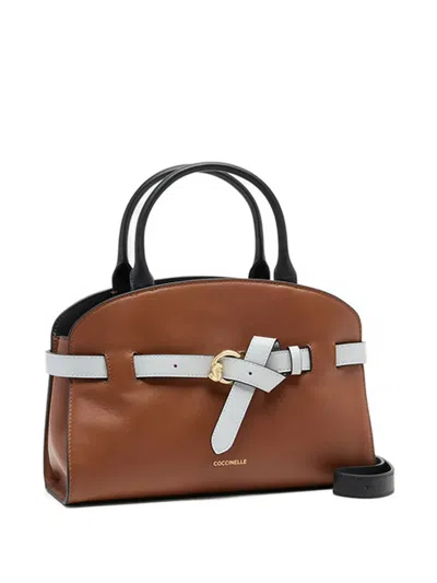 Coccinelle Structured Brown Handbag With Black Accents In Brown