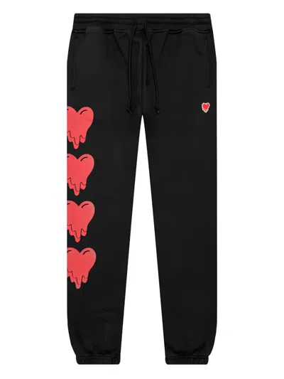 Emotionally Unavailable Melting-heart Logo Sweatpants In Black