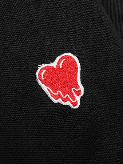 Emotionally Unavailable Melting-heart Logo Sweatpants In Black