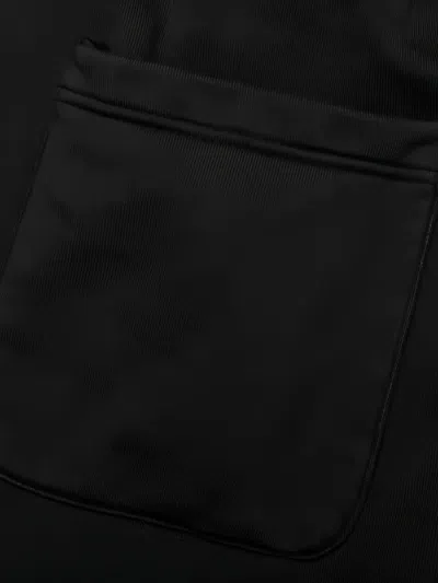 Emotionally Unavailable Melting-heart Logo Sweatpants In Black