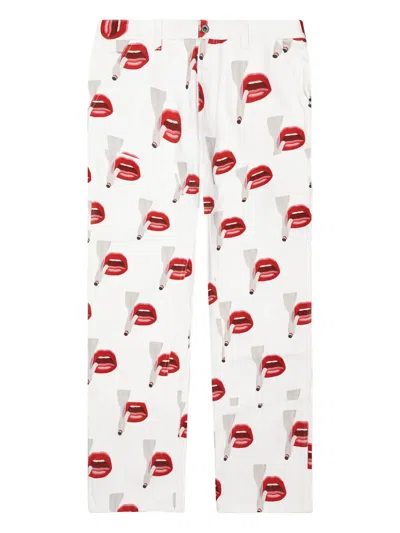 Emotionally Unavailable X Tom Wesselmann Smoking Lips-print Trousers In White