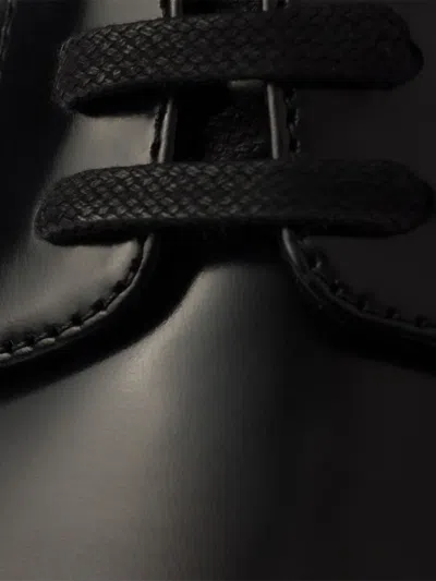 Prada Brushed Leather Lace-up Shoes In Black