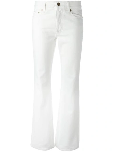 Shop Saint Laurent Original Cropped Flared Jeans In White