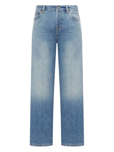 Gucci Blue Jeans With Logo Patch On The Rear And Faded Effect In Denim Woman