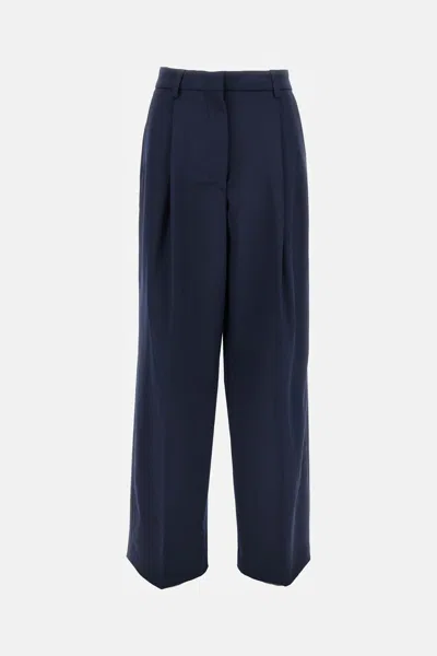 The Latest Thelatest Midnight Blue Wool Blend Trousers In Blue