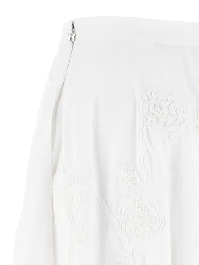 Rotate Birger Christensen Floral Embroidered A-line Midi Skirt In Organic Cotton In White