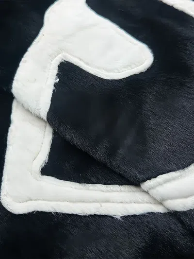 脸孔图案皮草夹克