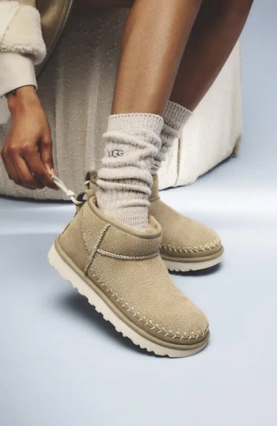 Ugg (r) Classic Ultra Mini Biarritz Genuine Shearling Lined Bootie In Yellow