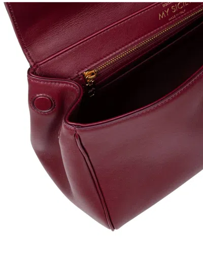 Dolce & Gabbana Bordeaux Handbag With Key And Padlock Detail And Adjustable And Removable Shoulder Strap In Red