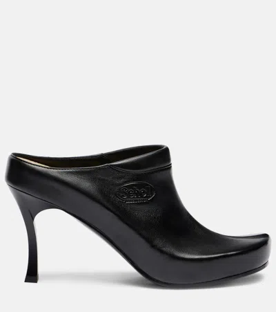 Balenciaga Debossed Logo Heeled Mules In Black
