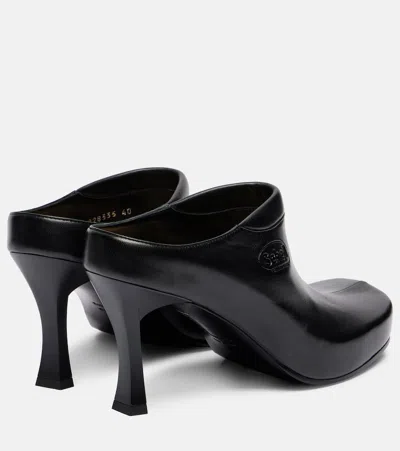 Balenciaga Debossed Logo Heeled Mules In Black