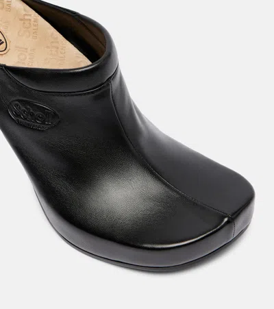Balenciaga Debossed Logo Heeled Mules In Black