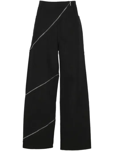 Alaïa Ribbed Knit High Neck Bodysuit With Zipper In Black
