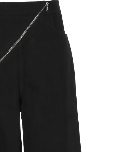 Alaïa Ribbed Knit High Neck Bodysuit With Zipper In Black