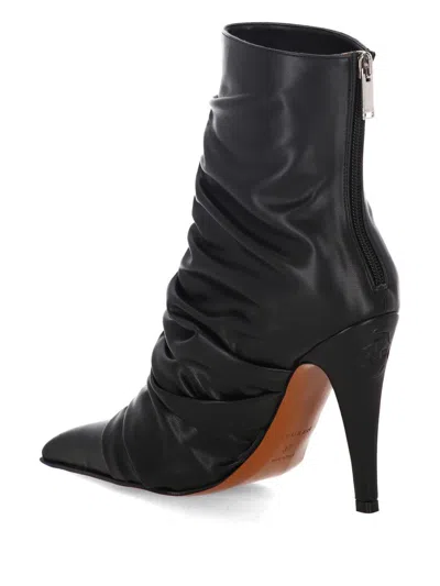 Alexander Mcqueen Boots In Black