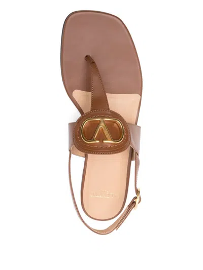 Valentino Garavani Vlogo Signature Leather Thong Sandals In Brown