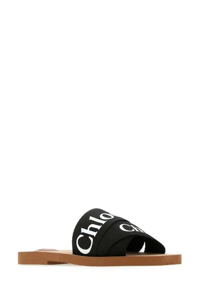 Chloé Woody Black Sabot With Contrasting Logo In Canvas