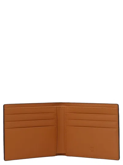 Mcm Printed Half-fold Wallet In Brown