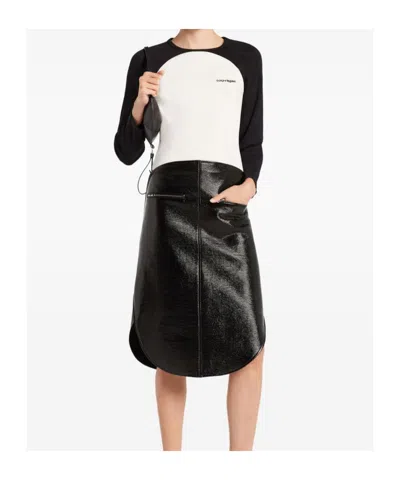 Courrèges Long-sleeved Contrast T-shirt With Rounded Hem And Logo Print In Black