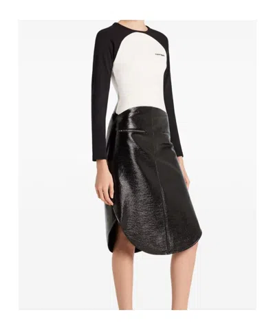 Courrèges Long-sleeved Contrast T-shirt With Rounded Hem And Logo Print In Black