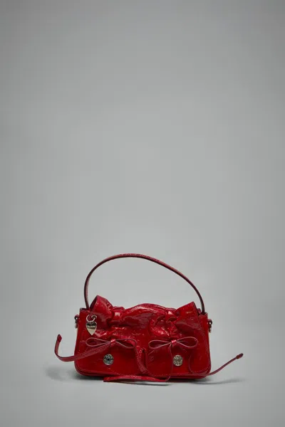 Acne Studios Multipocket Crinkle Patent Leather Top Handle Bag In Red