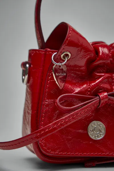 Acne Studios Multipocket Crinkle Patent Leather Top Handle Bag In Red