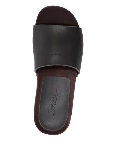 La Rose Studded Leather Clogs In Black