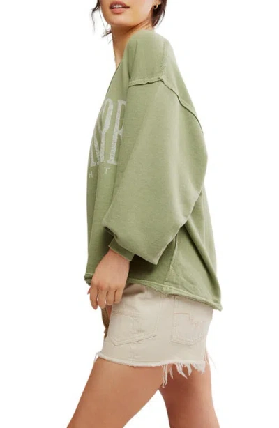 Free People Wtf Venice Oversize Cotton Blend Graphic Sweatshirt In Green