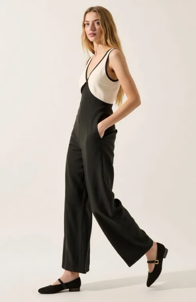 Modenaire Sleeveless Wide Leg Jumpsuit With Deep V-neckline In Multi