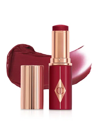 Charlotte Tilbury Unreal Lip + Cheek Glow Blush Stick With Hyaluronic Acid Berry Glow 0.31 Oz/9 ml In Purple