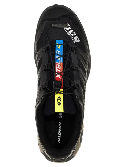 Salomon Streamlined Black Sneakers With Rugged Outsole And Breathable Upper