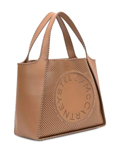 Stella Mccartney Perforated Logo Faux Leather Tote Bag In Brown