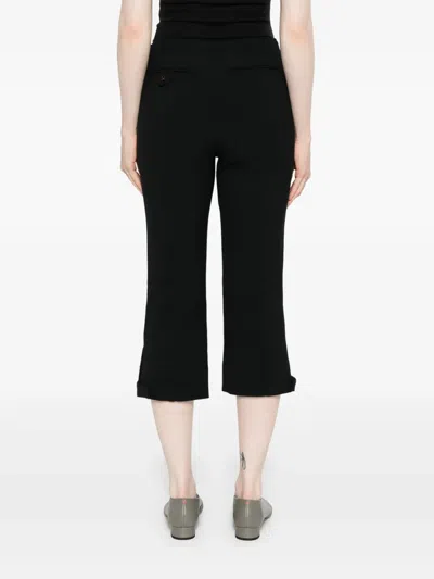 Victoria Beckham Buttoned Cuff Cropped Wool Trousers In Black