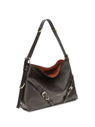 Givenchy Medium Voyou Calfskin Shoulder Bag With Buckle Fastening In Brown