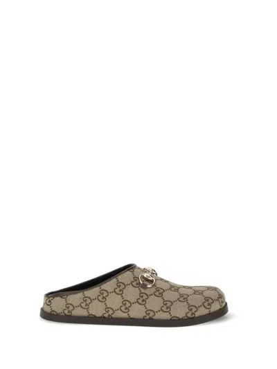 Gucci Gg Monogram Horsebit Flat Mules In Brown