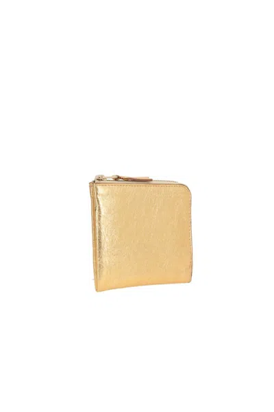 Comme Des Garçons Wallets In Gold