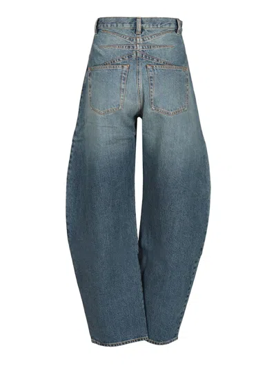 Alaïa Rounded Blue Jeans With Faded Effect In Blue