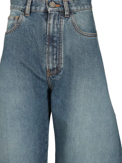 Alaïa Rounded Blue Jeans With Faded Effect In Blue