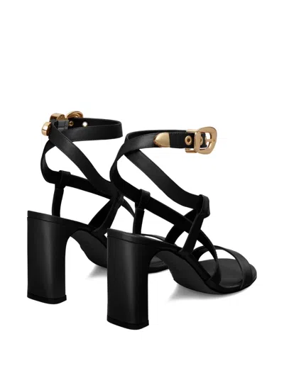 Stuart Weitzman Buckle-embellished Crossover Sandals In Black