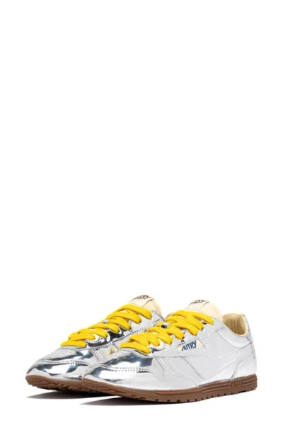 Autry Front Lace Sneakers In Bright Yellow And Shiny Silver In Multi